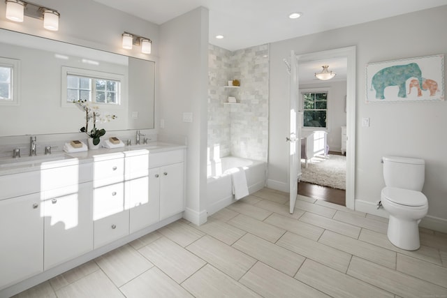 16 Gault Park Dr, Westport, CT 06880 - ensuite bathroom with double vanity, shower / tub combination, and recessed lighting
