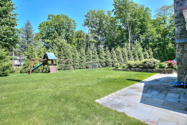 16 Gault Park Dr, Westport, CT 06880 - view of green lawn featuring a playground and a patio area