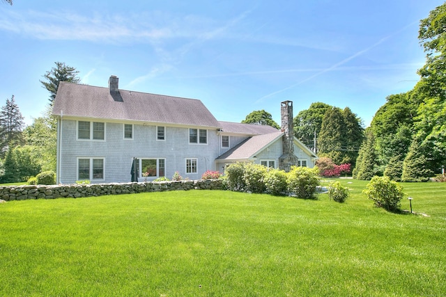 16 Gault Park Dr, Westport, CT 06880 - rear view of house featuring a chimney and a lawn