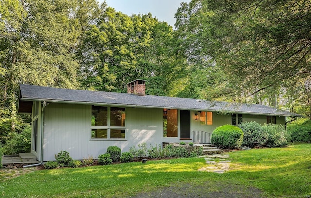 60 Ferry Bridge Rd, Washington, CT 06793 - view of front facade with a chimney and a front lawn