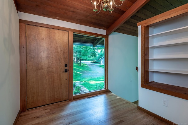 60 Ferry Bridge Rd, Washington, CT 06793 - entrance foyer featuring a wooden ceiling with exposed beams, a chandelier, plenty of natural light, and wood finished floors