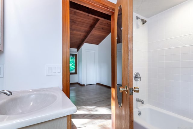 60 Ferry Bridge Rd, Washington, CT 06793 - full bathroom with wood finished floors, bathtub / shower combination, vanity, and beam ceiling