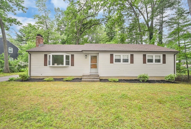 606 Forest St, East Hartford, CT 06118 - ranch-style home featuring a front yard, a chimney, and entry steps