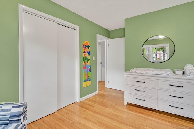 606 Forest St, East Hartford, CT 06118 - bedroom featuring light wood-style flooring and a closet