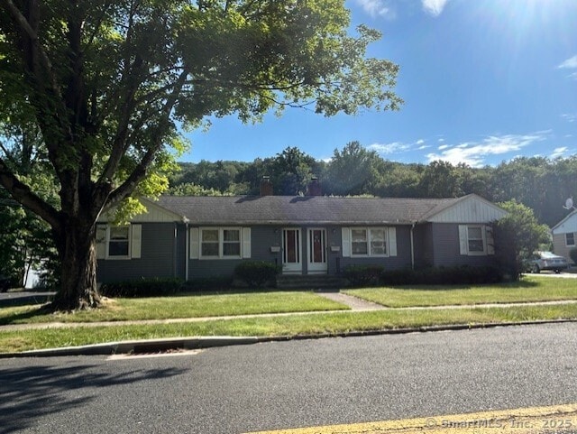 276 Spencer St, Naugatuck, CT 06770 - ranch-style house featuring a chimney and a front yard
