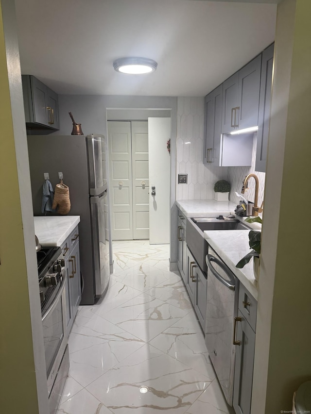 37 Brookwood Dr Apt D, Rocky Hill, CT 06067 - kitchen featuring appliances with stainless steel finishes, light countertops, gray cabinets, and light marble finish flooring