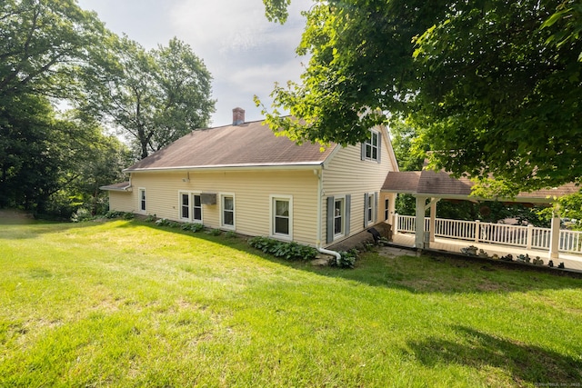 270 Decicco Rd, Waterbury, CT 06705 - back of house featuring a chimney and a yard