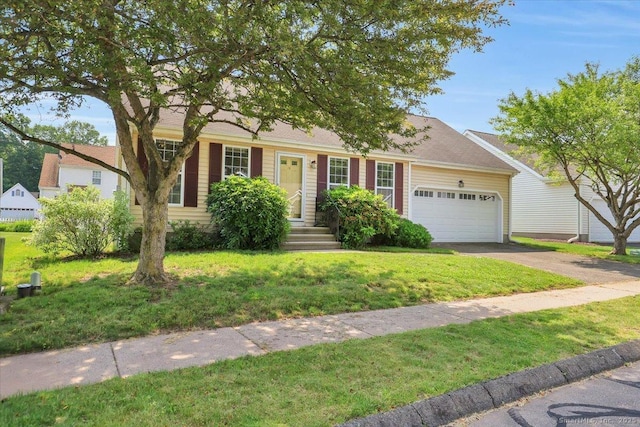 46 Rolling Grn, Middletown, CT 06457 - view of front facade with driveway, a garage, and a front yard