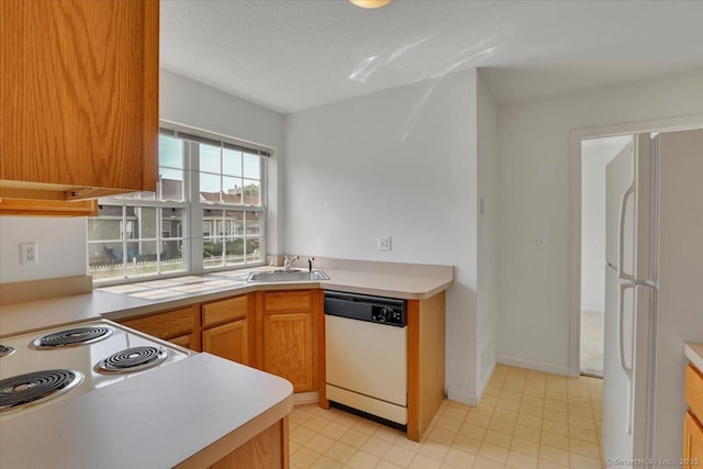 46 Rolling Grn, Middletown, CT 06457 - kitchen with white appliances and light countertops