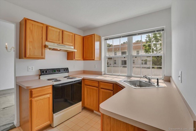 46 Rolling Grn, Middletown, CT 06457 - kitchen with electric stove, under cabinet range hood, light countertops, and light tile patterned flooring