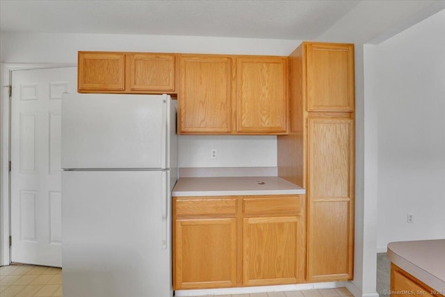 46 Rolling Grn, Middletown, CT 06457 - kitchen featuring freestanding refrigerator and light countertops