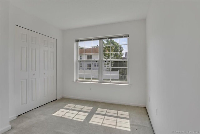 46 Rolling Grn, Middletown, CT 06457 - unfurnished bedroom featuring carpet flooring and a closet