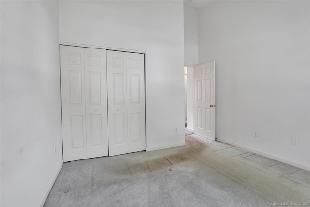 46 Rolling Grn, Middletown, CT 06457 - unfurnished bedroom with carpet, a closet, and a high ceiling