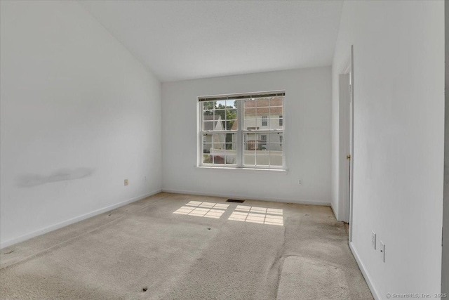 46 Rolling Grn, Middletown, CT 06457 - carpeted empty room with baseboards and lofted ceiling