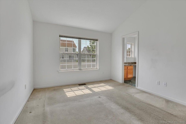 46 Rolling Grn, Middletown, CT 06457 - carpeted spare room with vaulted ceiling and baseboards
