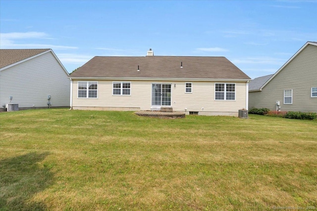 46 Rolling Grn, Middletown, CT 06457 - back of house with a yard and a chimney