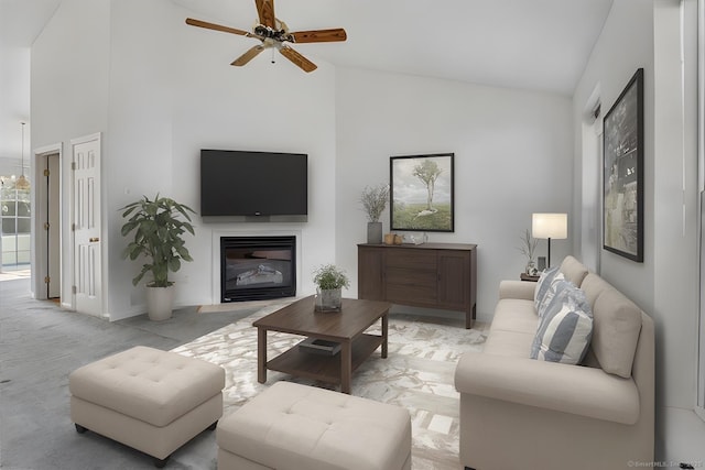 46 Rolling Grn, Middletown, CT 06457 - living room with high vaulted ceiling, a glass covered fireplace, a ceiling fan, and light colored carpet