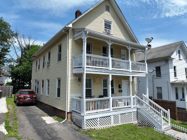 39 S Ave, Meriden, CT 06451 - view of front of property featuring a porch, a balcony, a chimney, and crawl space