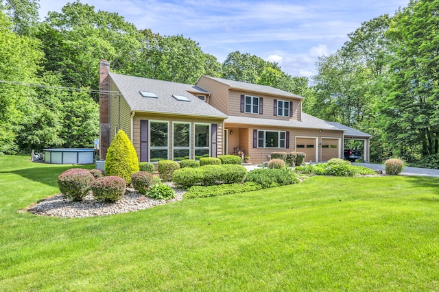 15 Quigley Rd, Wallingford, CT 06492 - view of front of property with a garage, asphalt driveway, roof with shingles, a front lawn, and a chimney