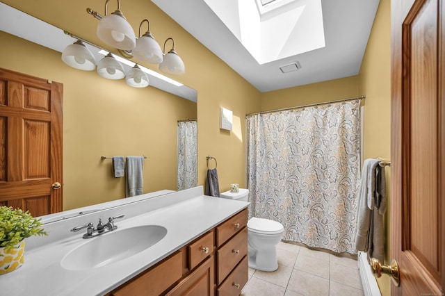 15 Quigley Rd, Wallingford, CT 06492 - bathroom with a skylight, tile patterned floors, vanity, and a shower with curtain