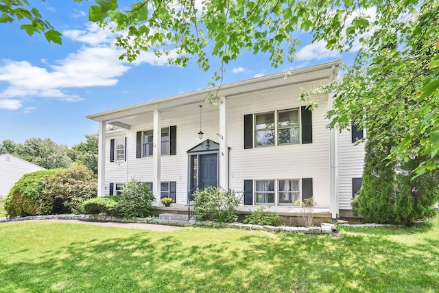9 Renee Ln, Enfield, CT 06082 - split foyer home with a front yard and a porch