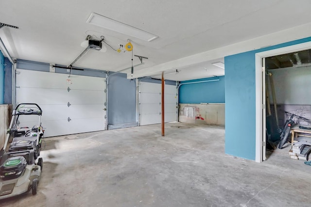 9 Renee Ln, Enfield, CT 06082 - garage featuring a garage door opener