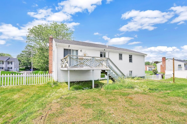 9 Renee Ln, Enfield, CT 06082 - rear view of property featuring a wooden deck, stairway, and a chimney