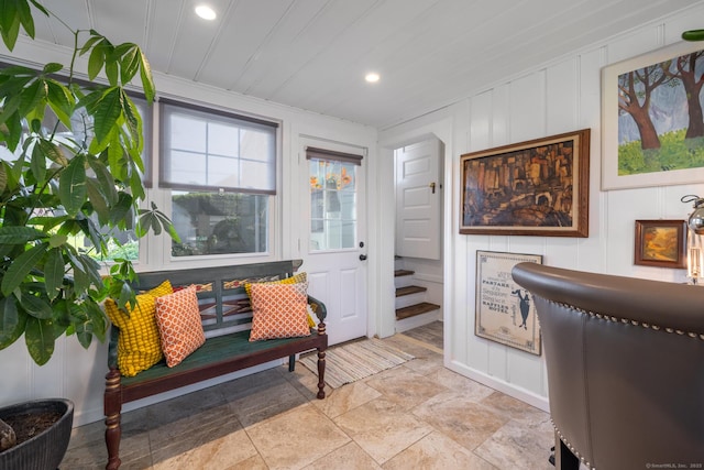 32 Holcomb St, West Haven, CT 06516 - entrance foyer featuring a decorative wall, recessed lighting, light stone finish floors, and ornamental molding