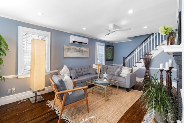 32 Holcomb St, West Haven, CT 06516 - living area featuring a wall mounted air conditioner, wood finished floors, ornamental molding, recessed lighting, and stairway