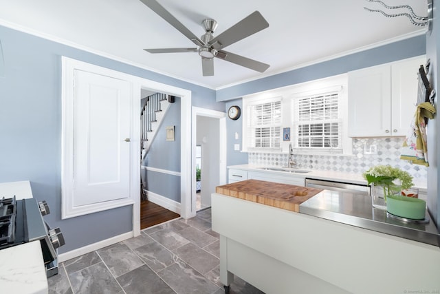 32 Holcomb St, West Haven, CT 06516 - kitchen featuring a ceiling fan, white cabinets, backsplash, ornamental molding, and range