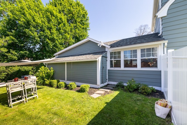 32 Holcomb St, West Haven, CT 06516 - view of property exterior with roof with shingles