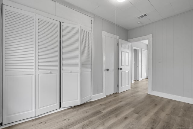 37 William St, Waterbury, CT 06702 - unfurnished bedroom featuring light wood-style floors and a closet