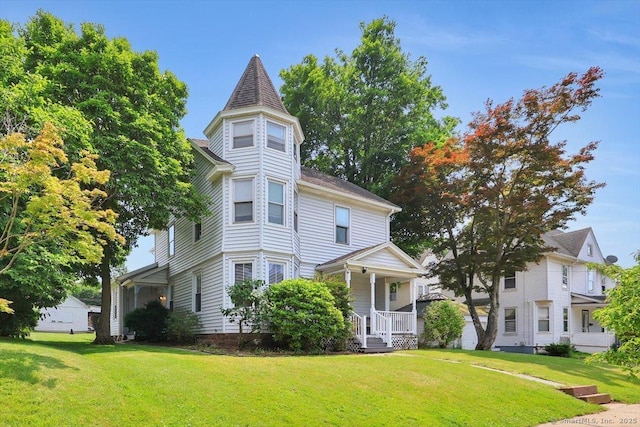 171 Lincoln St, Middletown, CT 06457 - victorian house with a front lawn and a porch