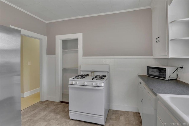 171 Lincoln St, Middletown, CT 06457 - kitchen featuring white appliances, open shelves, white cabinetry, crown molding, and wainscoting