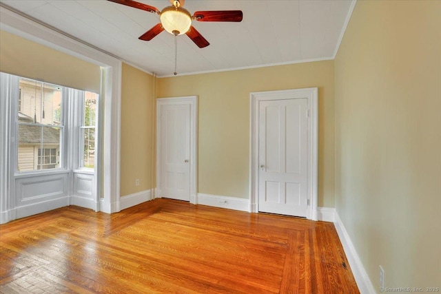 171 Lincoln St, Middletown, CT 06457 - empty room with light wood-type flooring, crown molding, and ceiling fan
