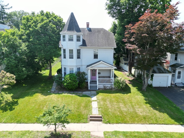 171 Lincoln St, Middletown, CT 06457 - victorian house featuring covered porch, a chimney, a front lawn, and roof with shingles