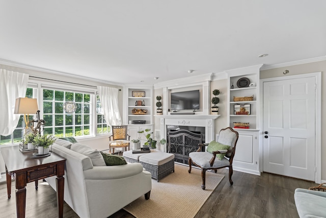 46 Tally Ho Rd, Ridgefield, CT 06877 - living room featuring ornamental molding, a fireplace, wood finished floors, and built in shelves