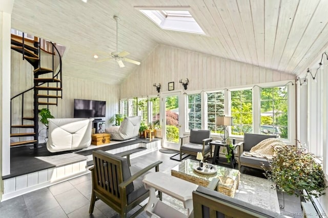 46 Tally Ho Rd, Ridgefield, CT 06877 - sunroom with high vaulted ceiling, a skylight, tile patterned flooring, wood walls, and wood ceiling