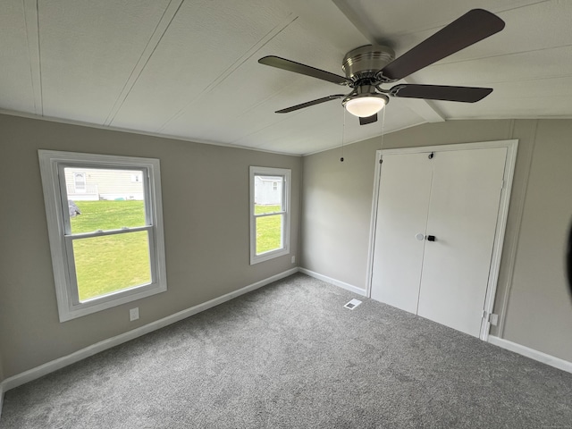 26 Jacqueline Ln, Windham, CT 06256 - unfurnished bedroom with carpet, vaulted ceiling, ceiling fan, and a closet