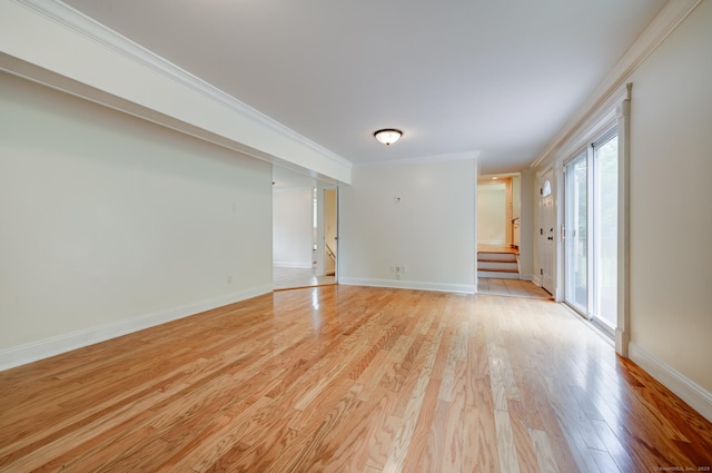 140 Braeside Dr, Hamden, CT 06514 - unfurnished room featuring ornamental molding, light wood-type flooring, and stairs