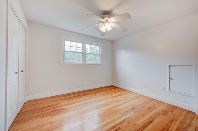 140 Braeside Dr, Hamden, CT 06514 - unfurnished bedroom featuring a closet, light wood-type flooring, and ceiling fan
