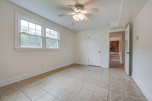 140 Braeside Dr, Hamden, CT 06514 - unfurnished bedroom featuring light tile patterned floors and ceiling fan