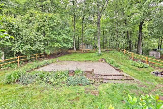 43 Phelps Rd, Marlborough, CT 06447 - fenced backyard featuring a shed and a view of trees