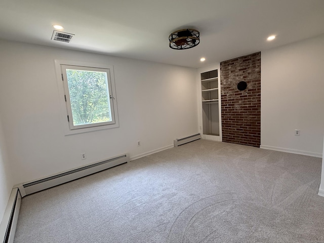 249 Wall St, Hebron, CT 06248 - unfurnished room featuring a baseboard heating unit, recessed lighting, built in features, and light carpet