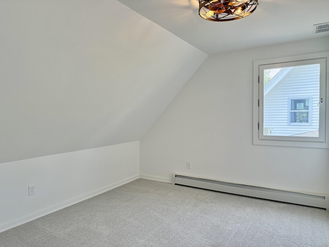 249 Wall St, Hebron, CT 06248 - bonus room featuring baseboard heating, light carpet, and vaulted ceiling