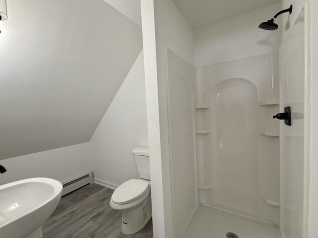 249 Wall St, Hebron, CT 06248 - full bathroom featuring a baseboard heating unit, a stall shower, and wood finished floors