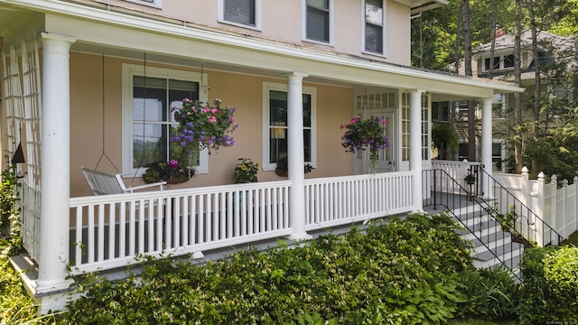 29 Circuit Ave, Waterbury, CT 06708 - property entrance with a porch and stucco siding
