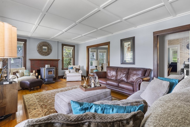 29 Circuit Ave, Waterbury, CT 06708 - living area featuring coffered ceiling, hardwood / wood-style flooring, healthy amount of natural light, and a wood stove