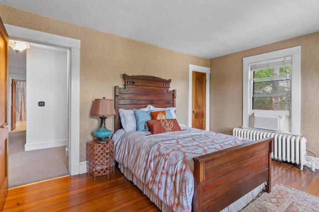 29 Circuit Ave, Waterbury, CT 06708 - bedroom with radiator heating unit and hardwood / wood-style floors
