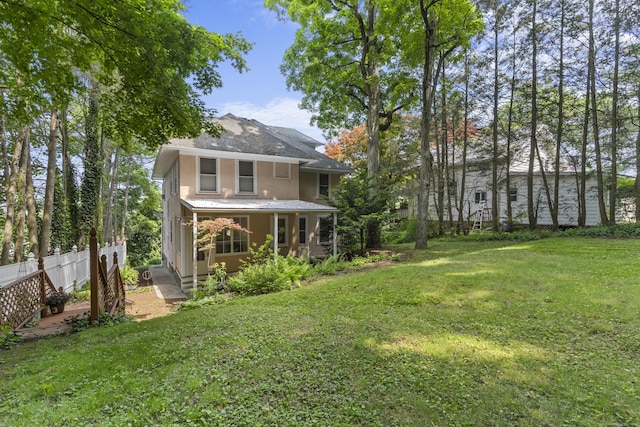 29 Circuit Ave, Waterbury, CT 06708 - back of property with stucco siding and a porch